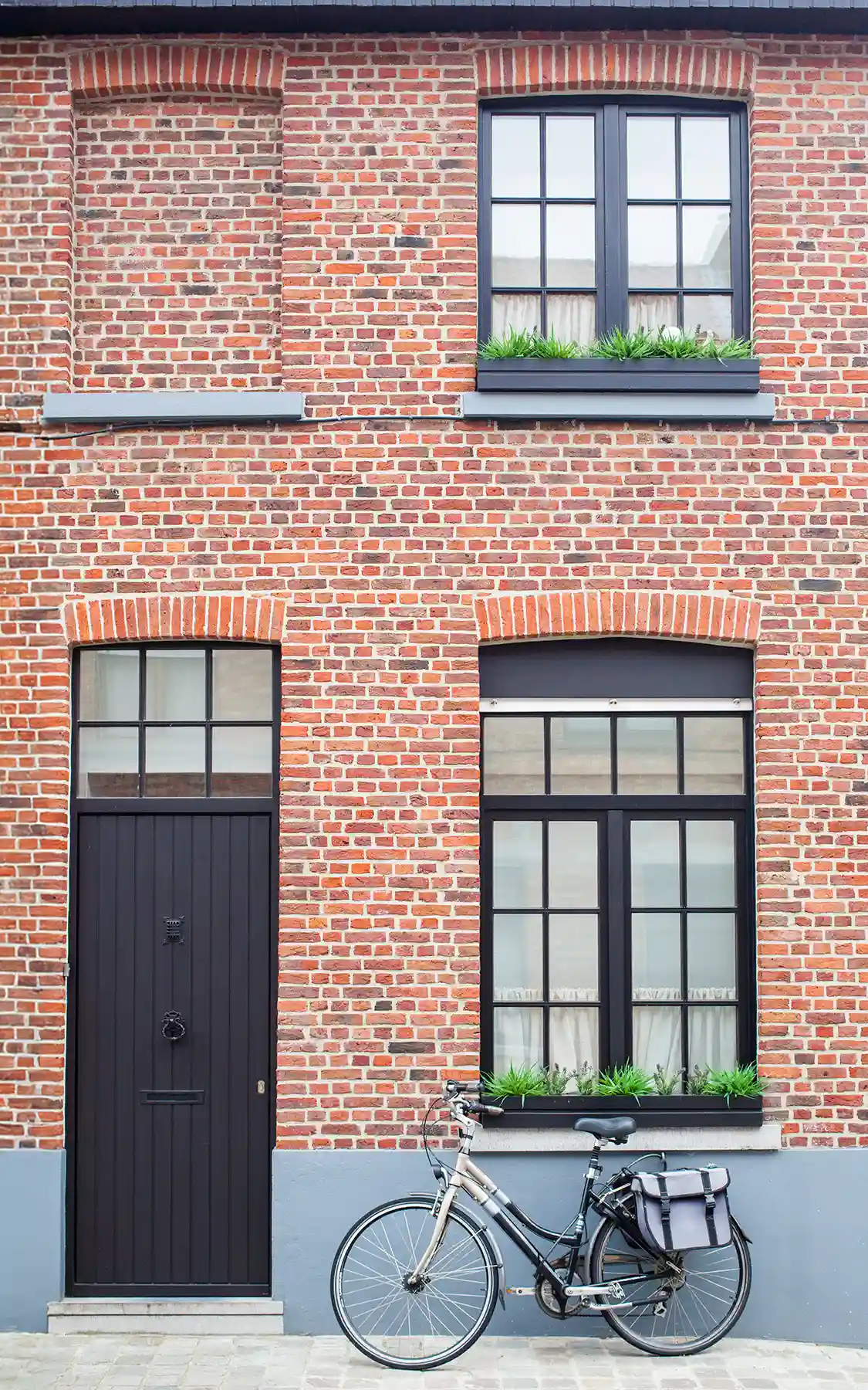 Voorgevel van een te schatten rijwoning